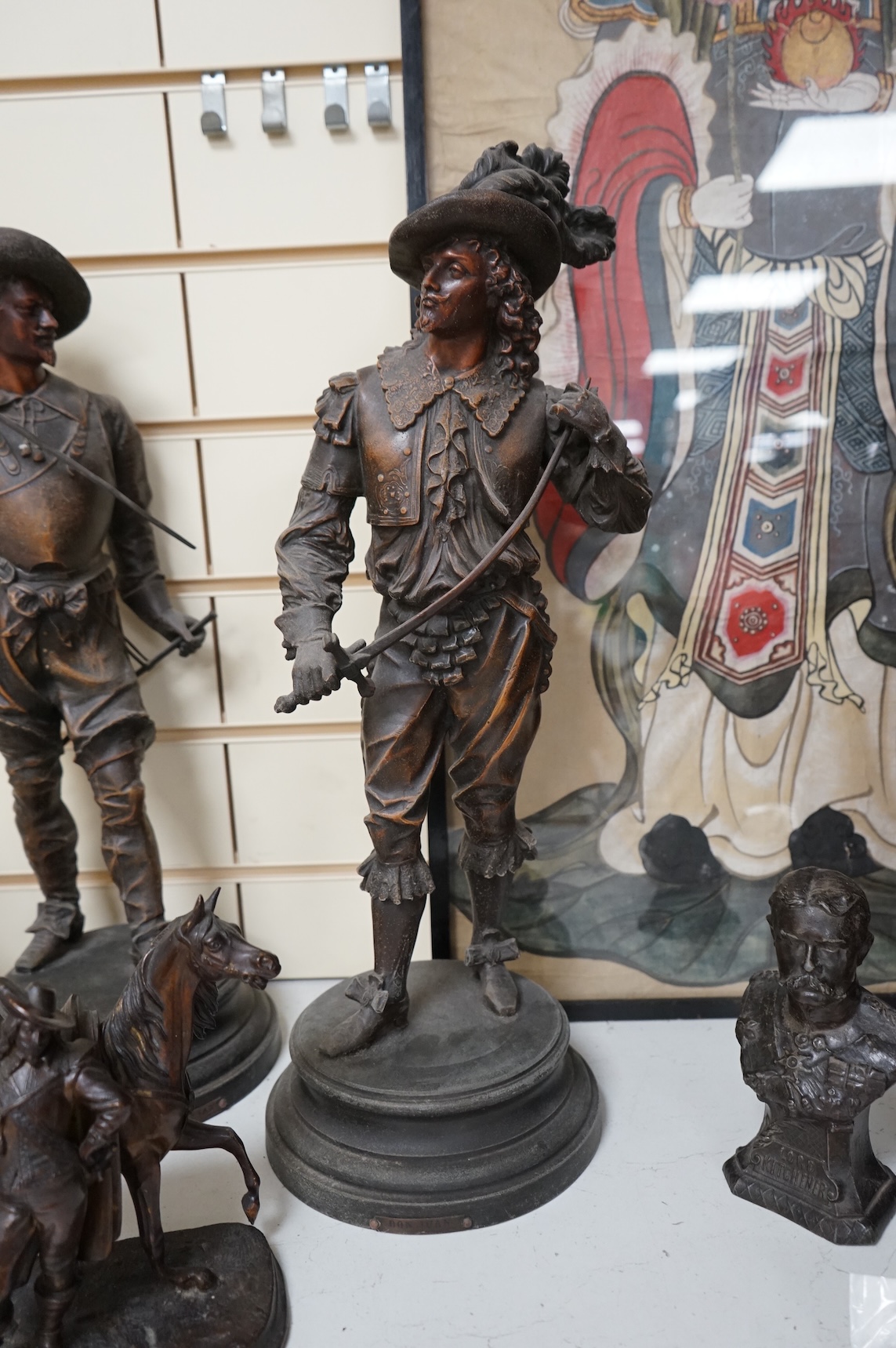 A pair of bronzed spelter figures, another pair of busts and a bronzed spelter group of a Cavalier and his horse, tallest 52cm